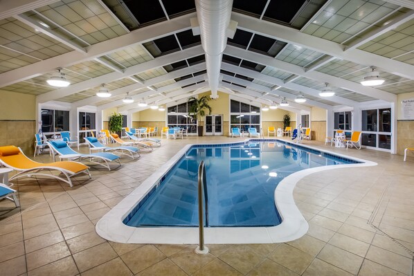 Indoor pool, open 10:00 AM to 10:00 PM, pool loungers