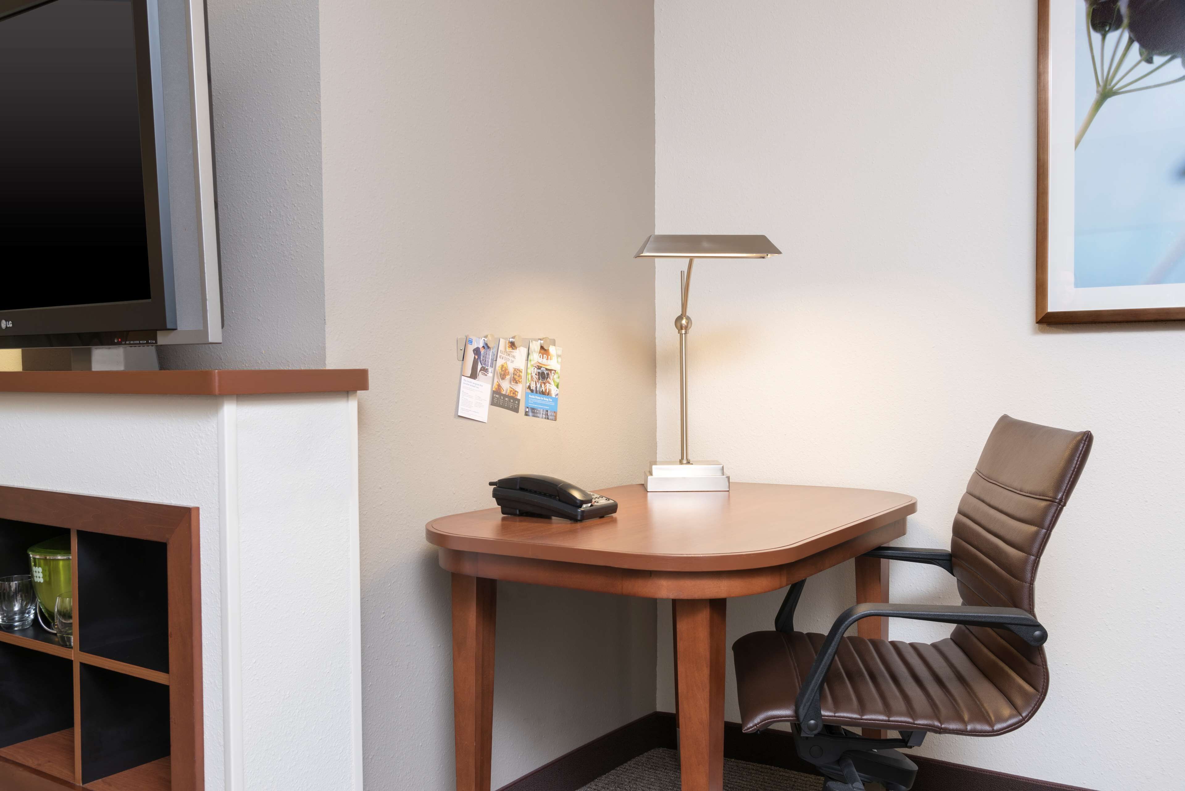 desk, blackout curtains, iron/ironing board, free cots/infant beds