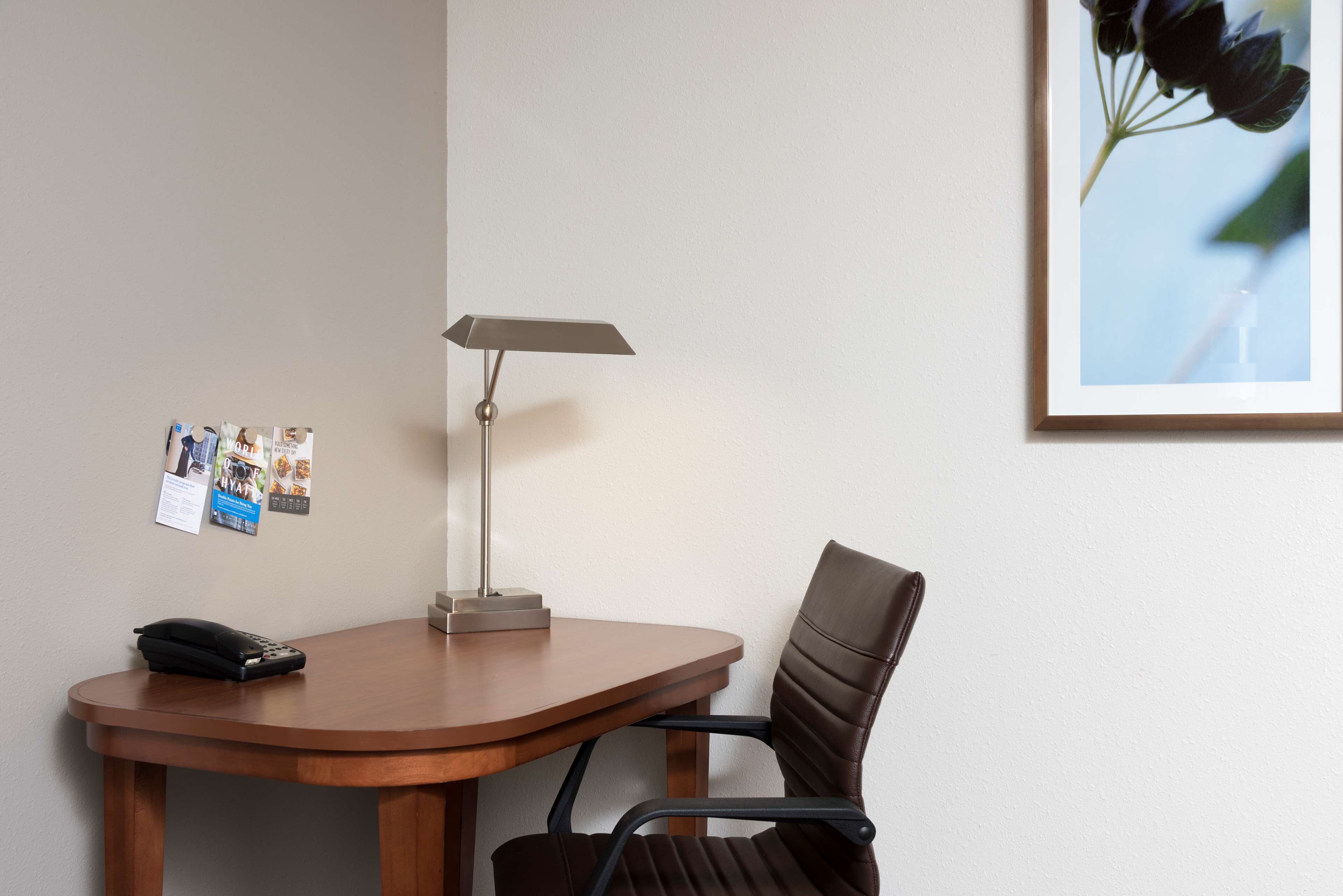 desk, blackout curtains, iron/ironing board, free cots/infant beds