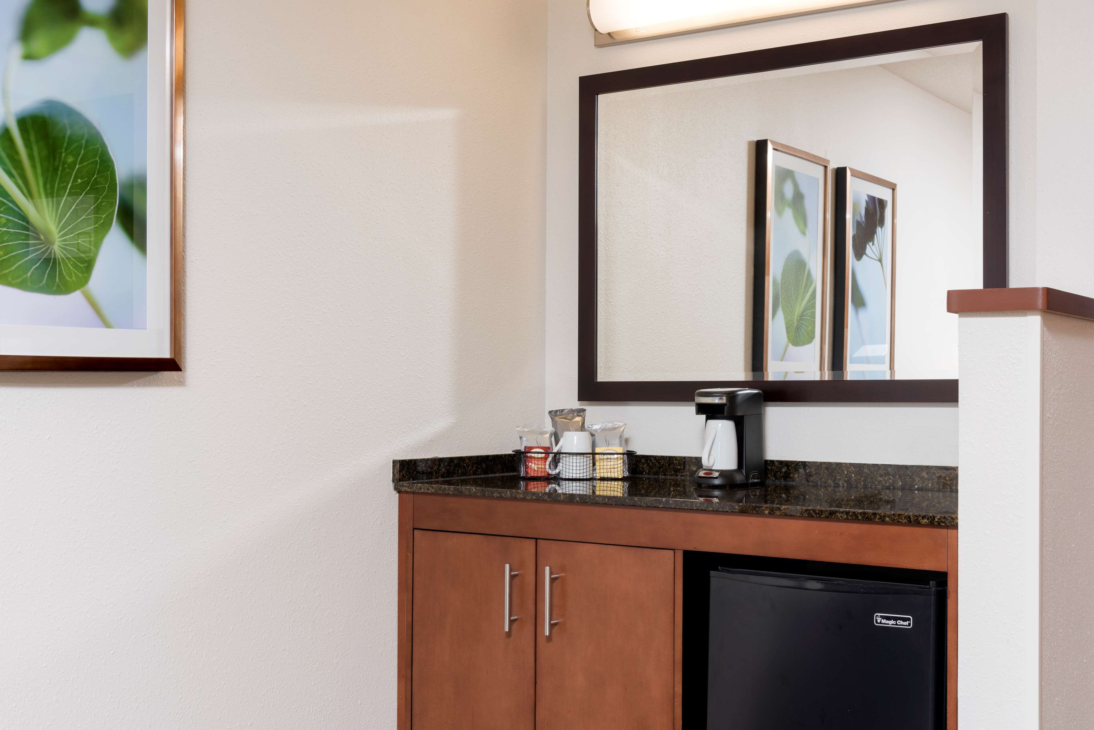 desk, blackout curtains, iron/ironing board, free cots/infant beds