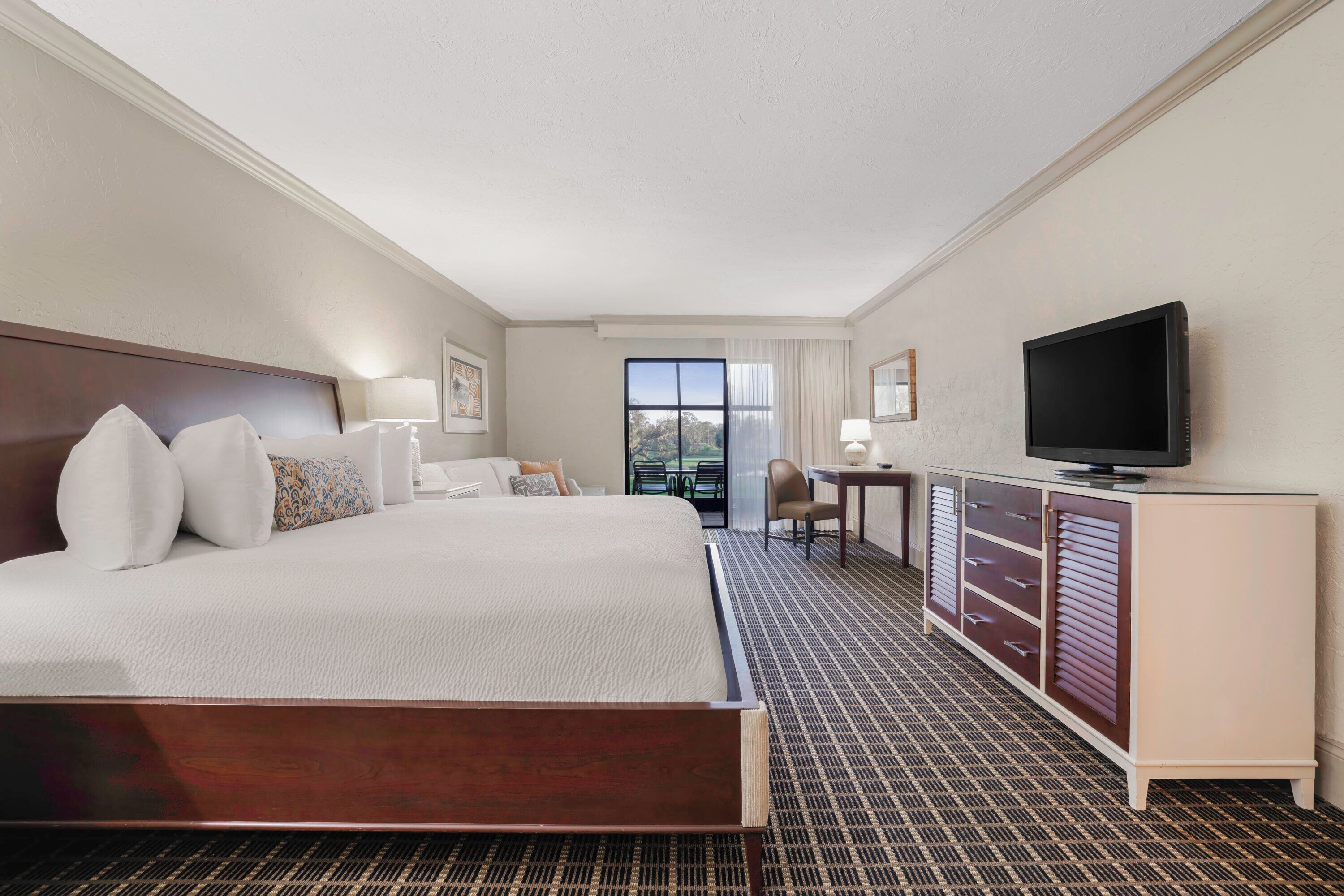 premier room, 1 king bed, golf view (club suite) | 1 bedroom, premium bedding, in-room safe, desk