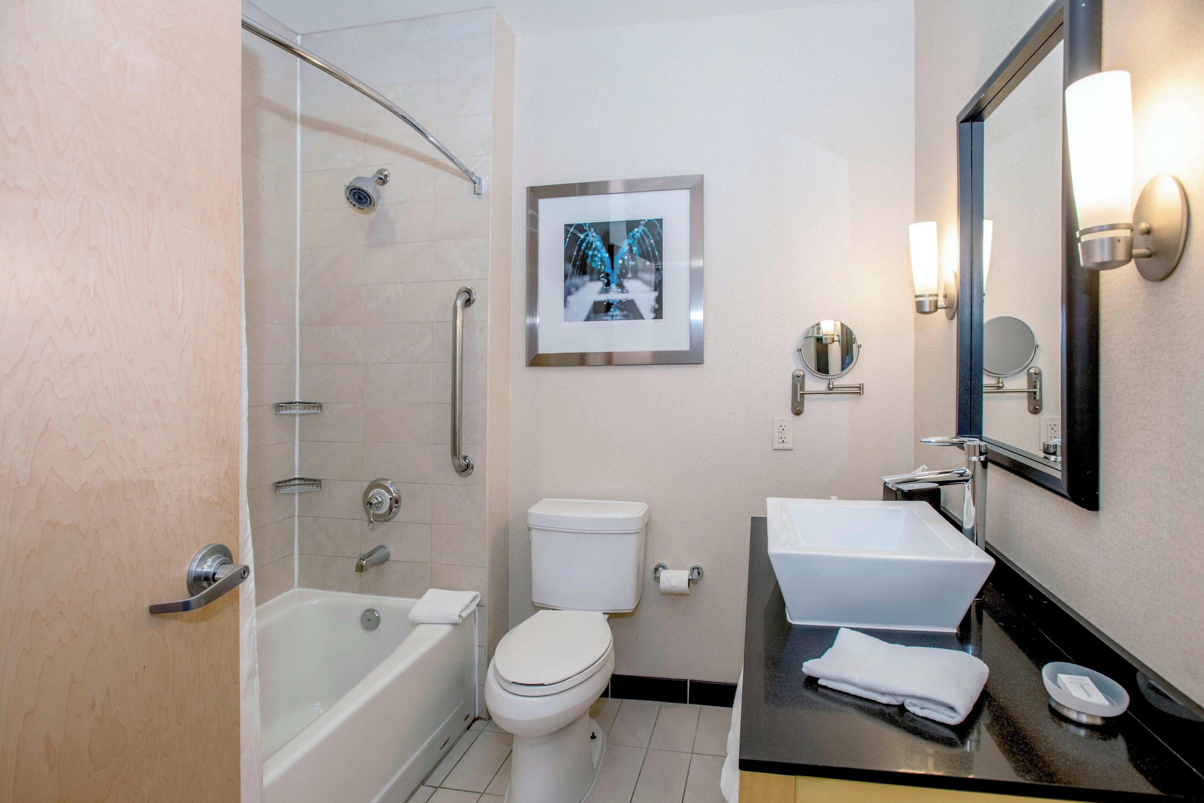 combined shower/bathtub, free toiletries, hair dryer, towels
