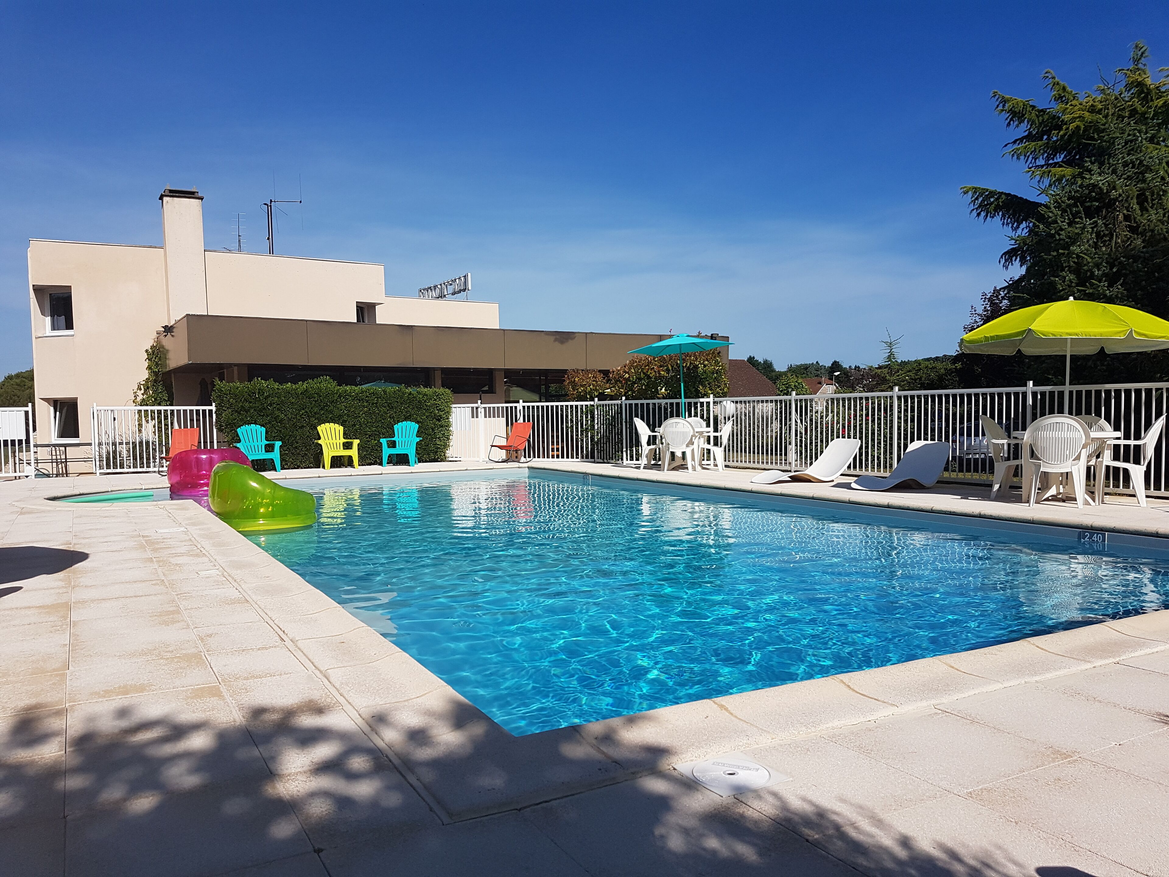 seasonal outdoor pool, pool umbrellas, pool loungers