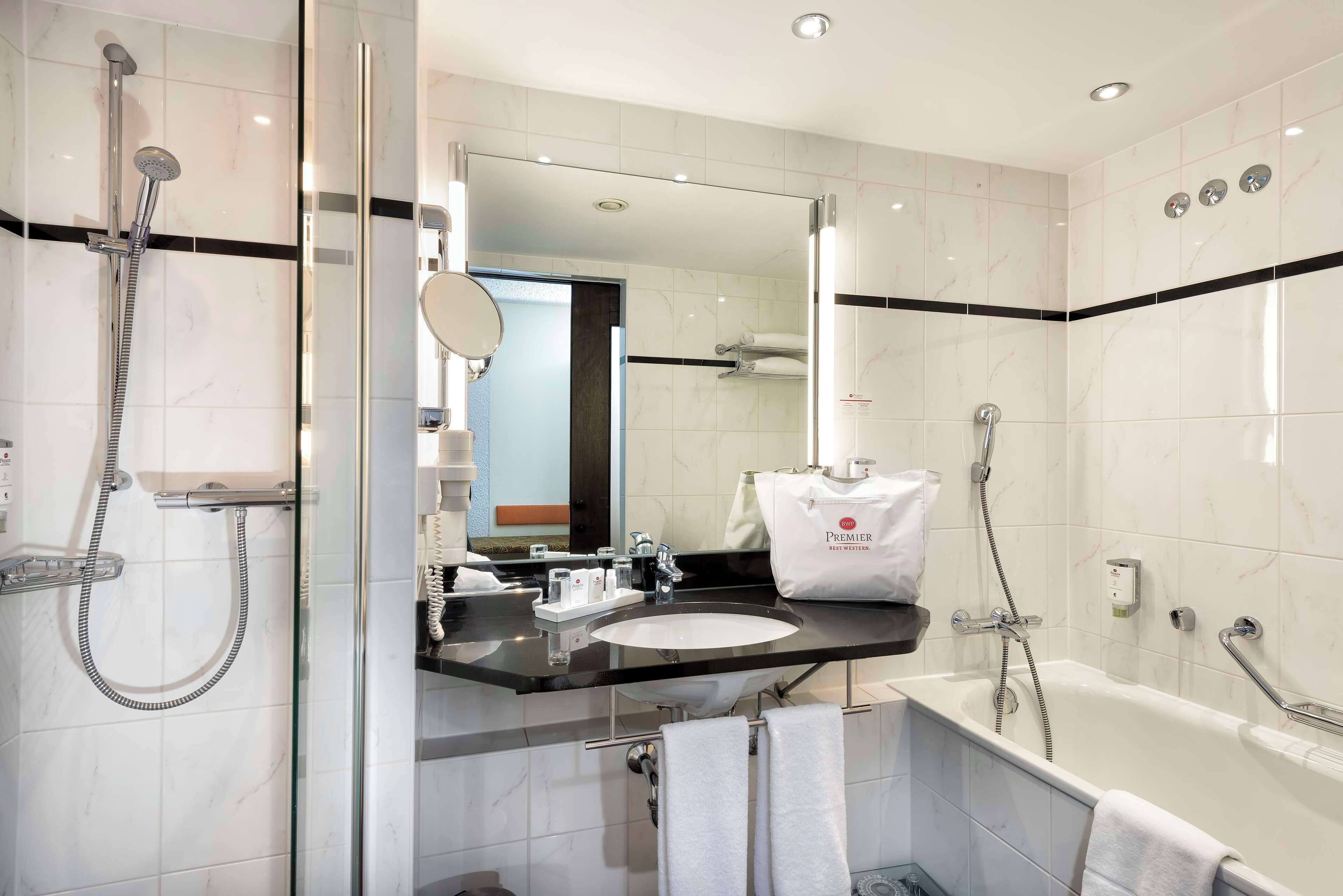 hair dryer, towels, soap, shampoo