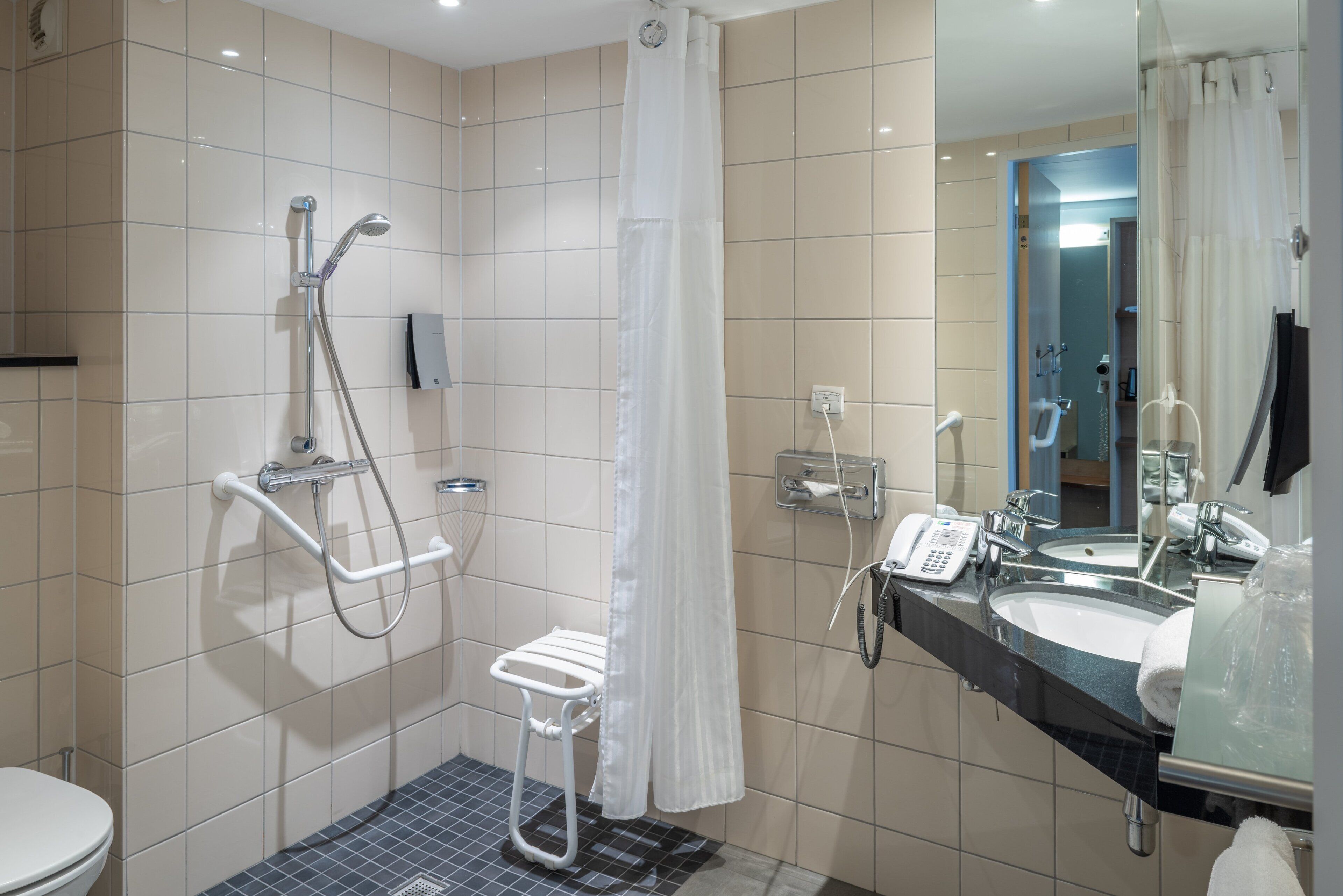 standard room, 1 double bed, accessible | bathroom | shower, hair dryer, towels
