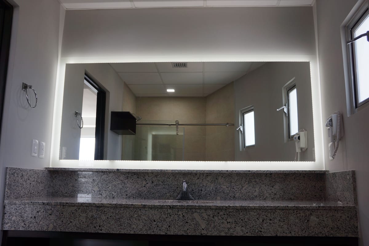 premium room, 2 double beds | bathroom | combined shower/bathtub, rainfall showerhead, hair dryer, towels