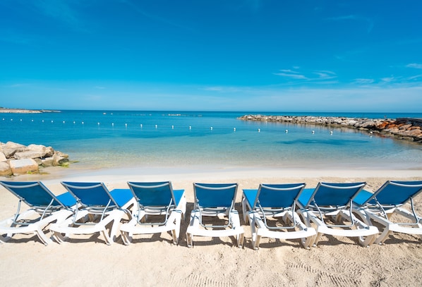 Private beach, white sand, sun-loungers, beach umbrellas