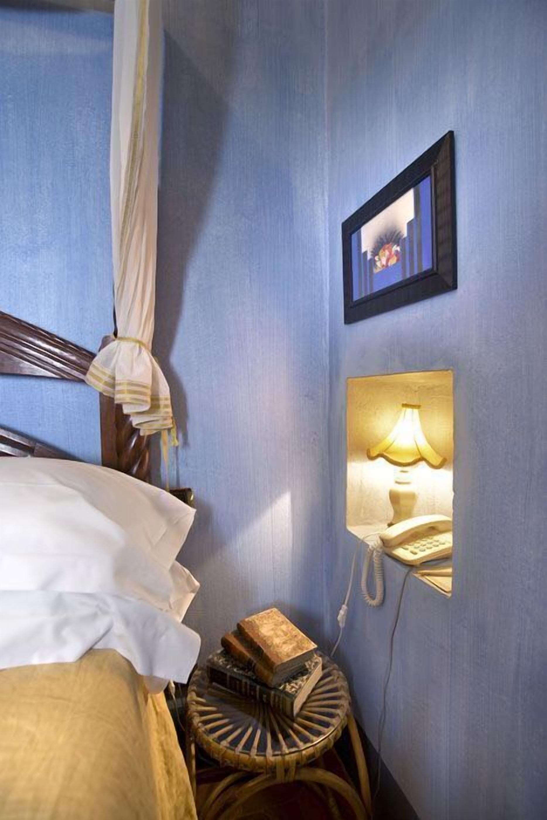 economy double room | premium bedding, down duvets, minibar, in-room safe