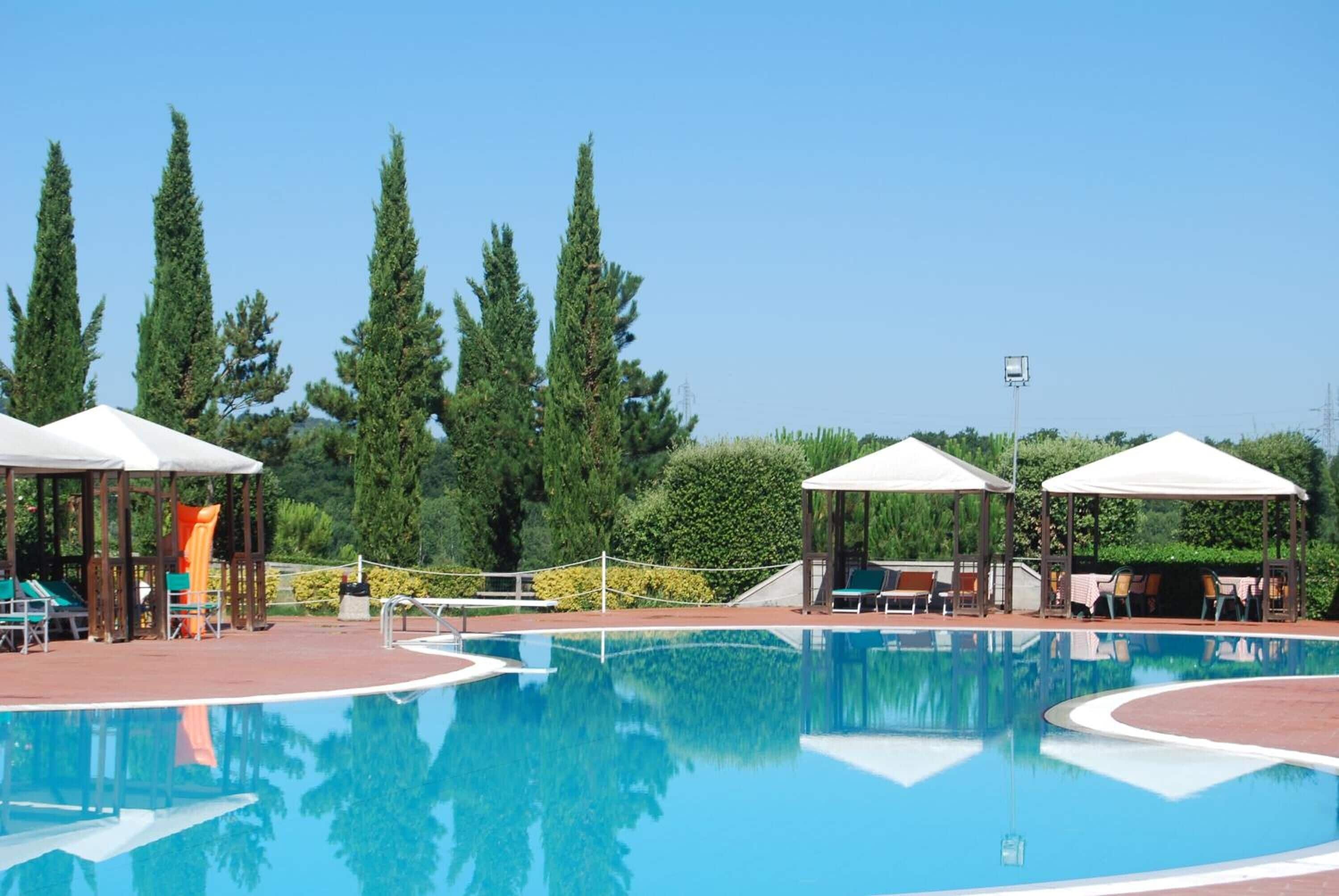 Seasonal outdoor pool, pool umbrellas, sun loungers