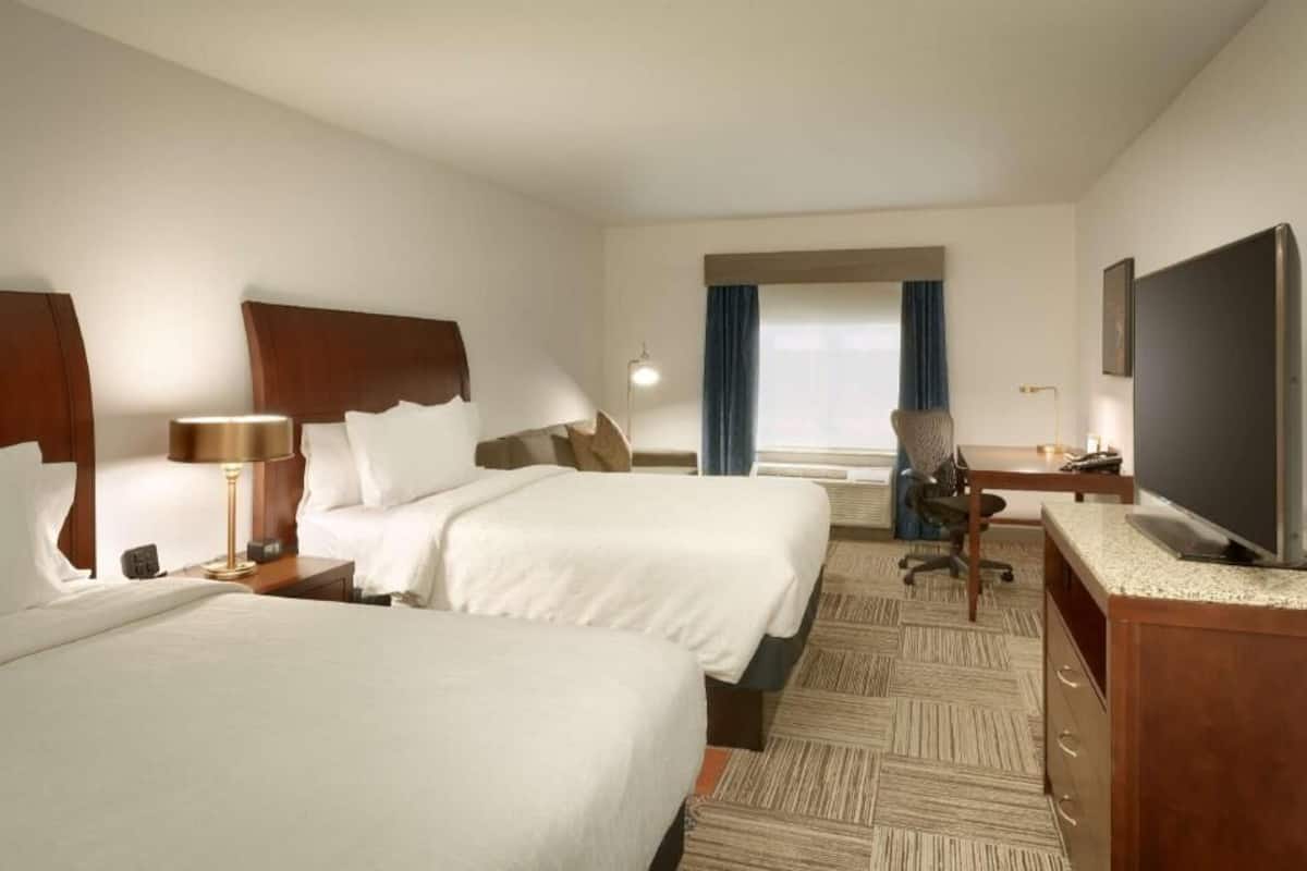 Premium bedding, blackout curtains, iron/ironing board, free WiFi