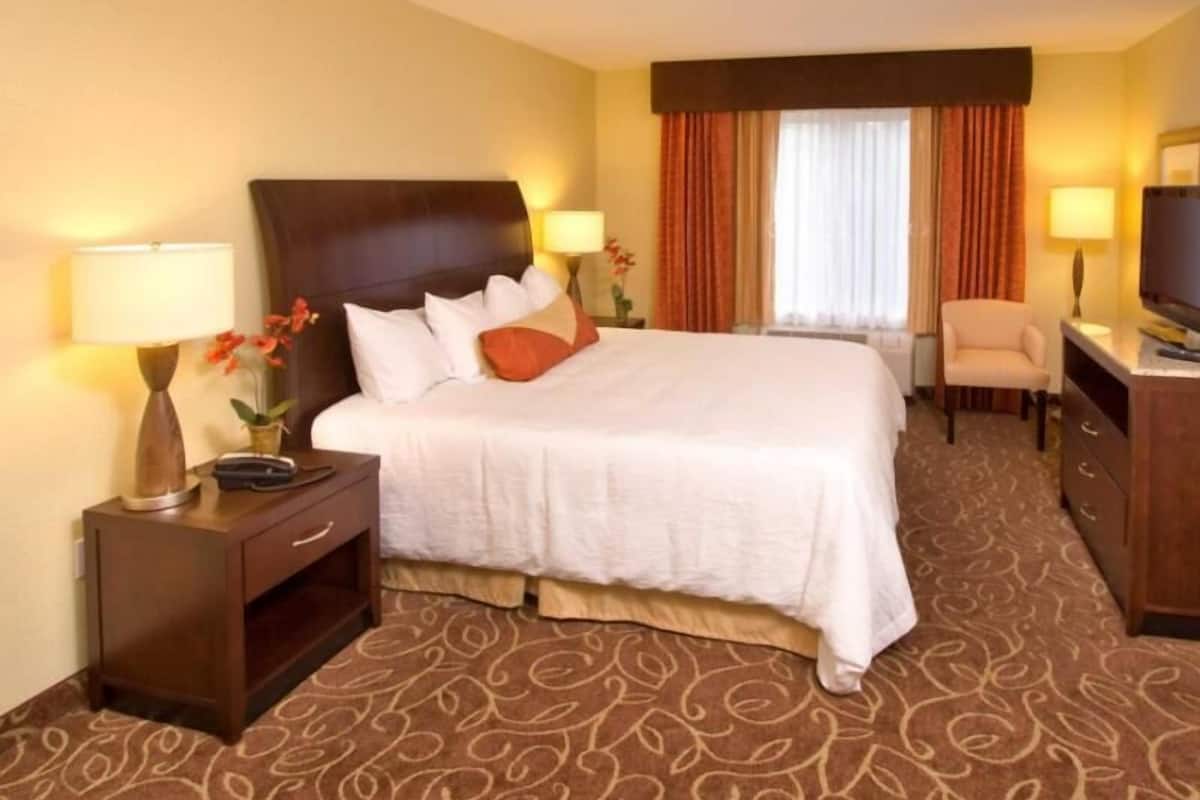 Premium bedding, blackout curtains, iron/ironing board, free WiFi