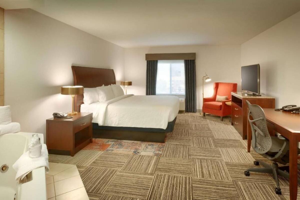 Premium bedding, blackout curtains, iron/ironing board, free WiFi