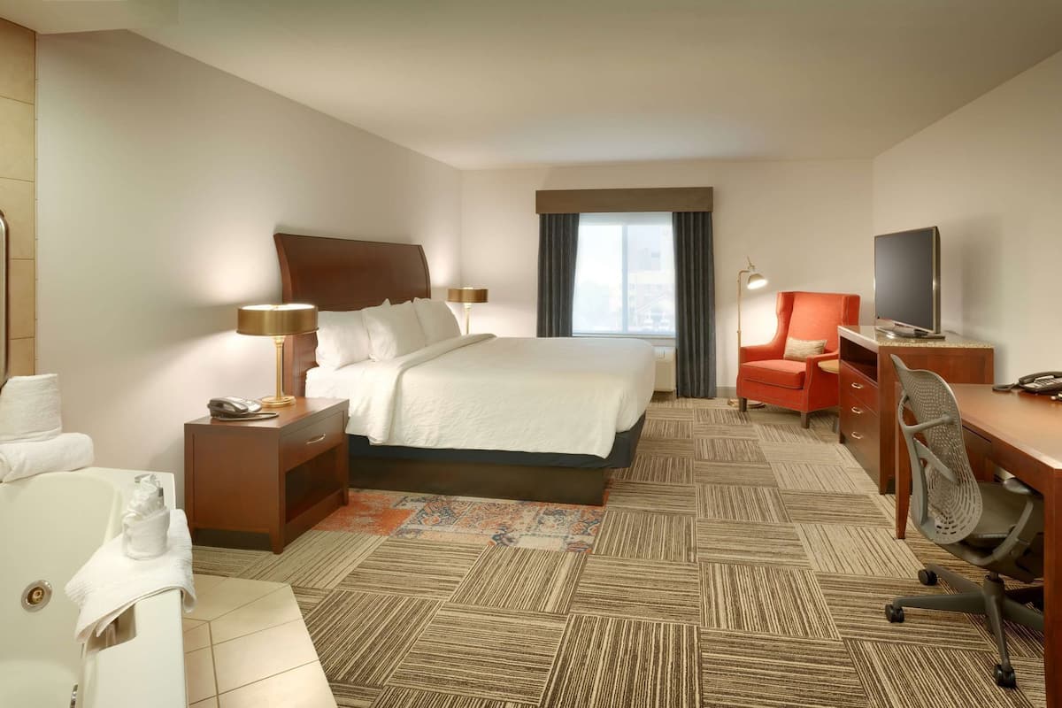 Premium bedding, blackout curtains, iron/ironing board, free WiFi