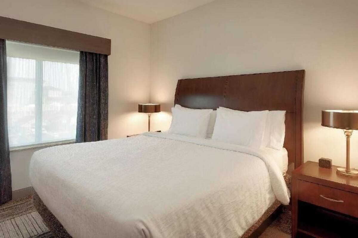 Premium bedding, blackout curtains, iron/ironing board, free WiFi