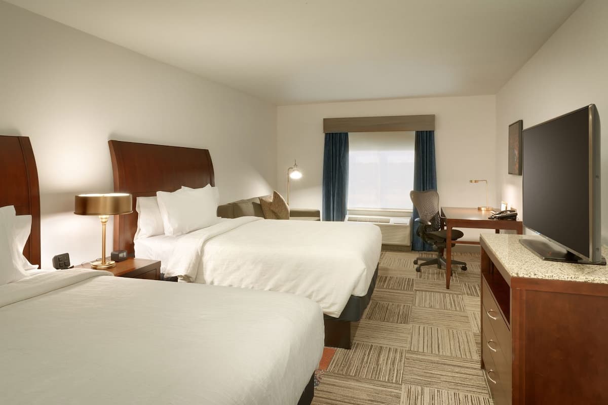 Premium bedding, blackout curtains, iron/ironing board, free WiFi