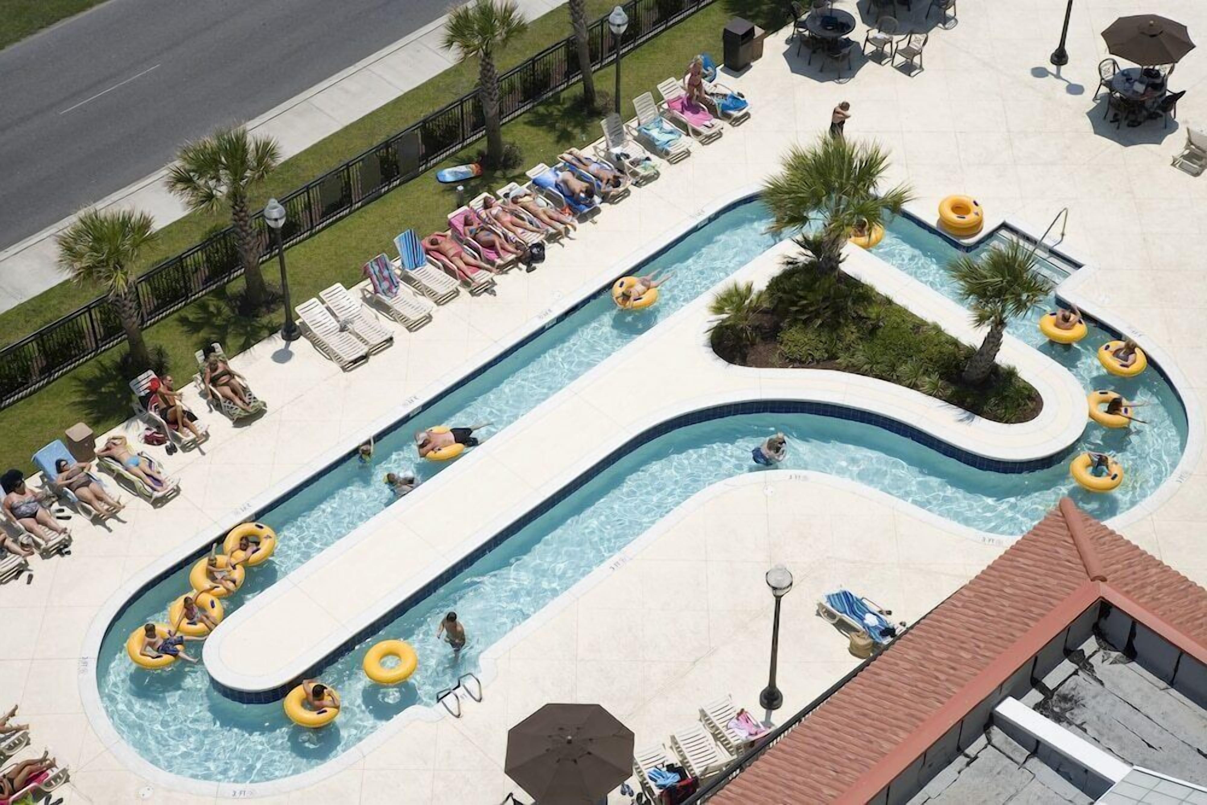 indoor pool, outdoor pool, open 8:00 am to 10:30 pm, pool umbrellas