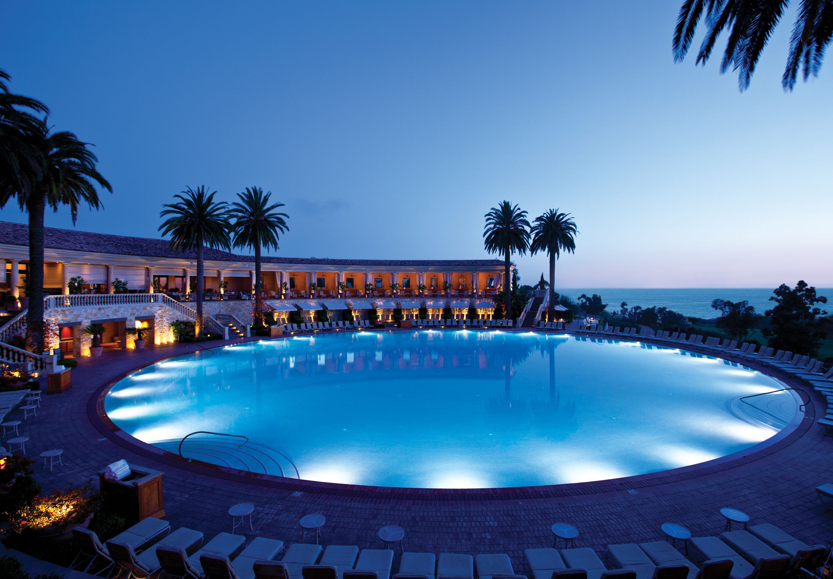 3 outdoor pools, open 9:00 AM to 7:00 PM, pool umbrellas