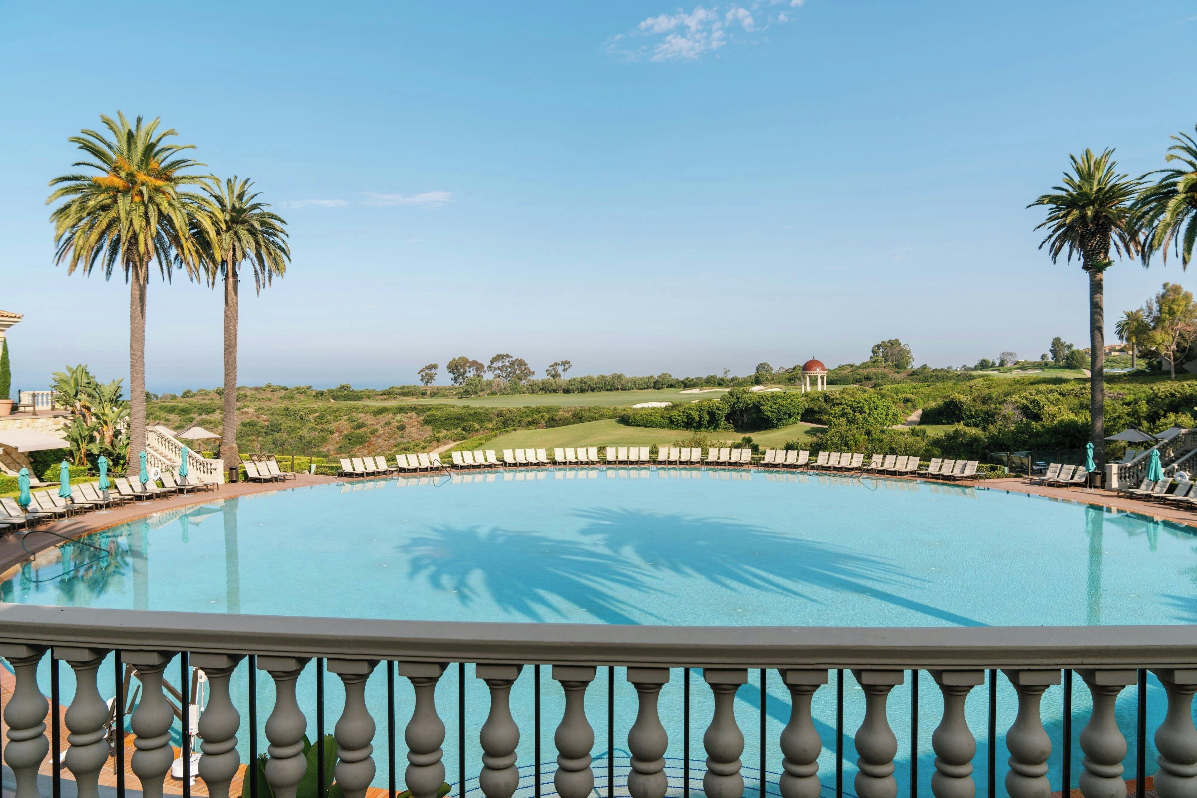 3 outdoor pools, open 9:00 AM to 7:00 PM, pool umbrellas