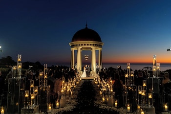 Couples can exchange vows in a romantic gazebo overlooking the calm sea. at The Resort at Pelican Hill
