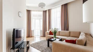 Apartamento estándar, 1 habitación | 1 dormitorio, caja fuerte, cortinas opacas y cunas gratuitas