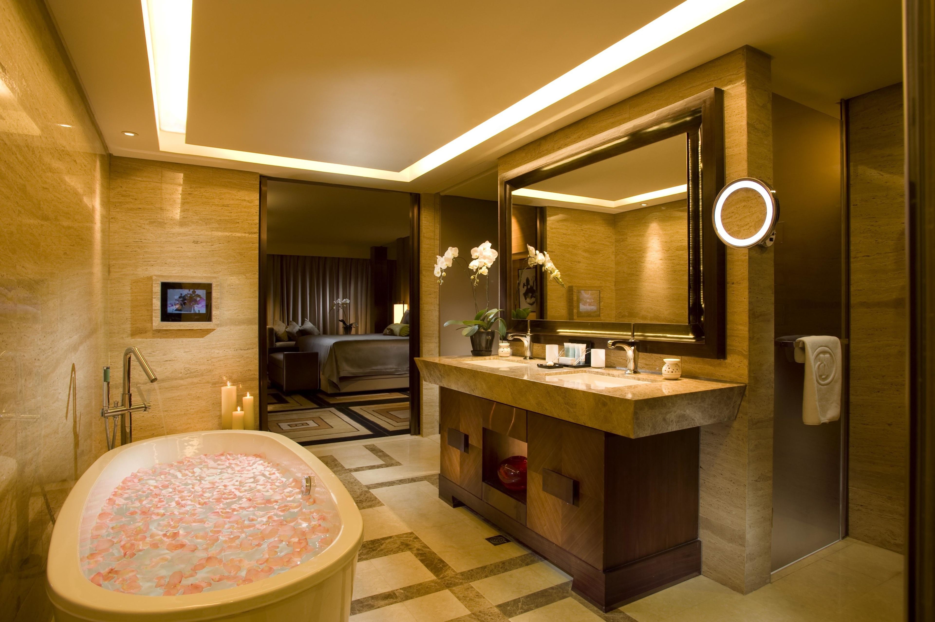 king deluxe suite | bathroom | separate bathtub and shower, deep-soaking bathtub, rainfall showerhead