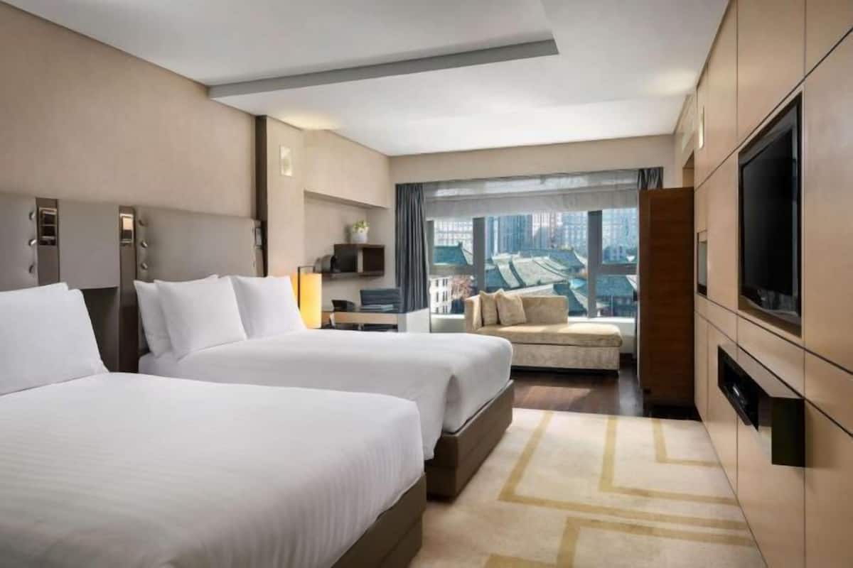 Ropa de cama de alta calidad, camas Select Comfort y minibar