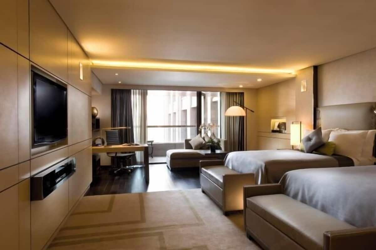 Ropa de cama de alta calidad, camas Select Comfort y minibar