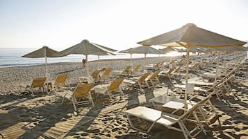 Private beach, sun loungers, beach umbrellas, beach towels