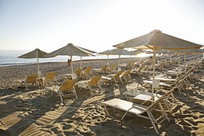 Private beach, sun loungers, beach umbrellas, beach towels