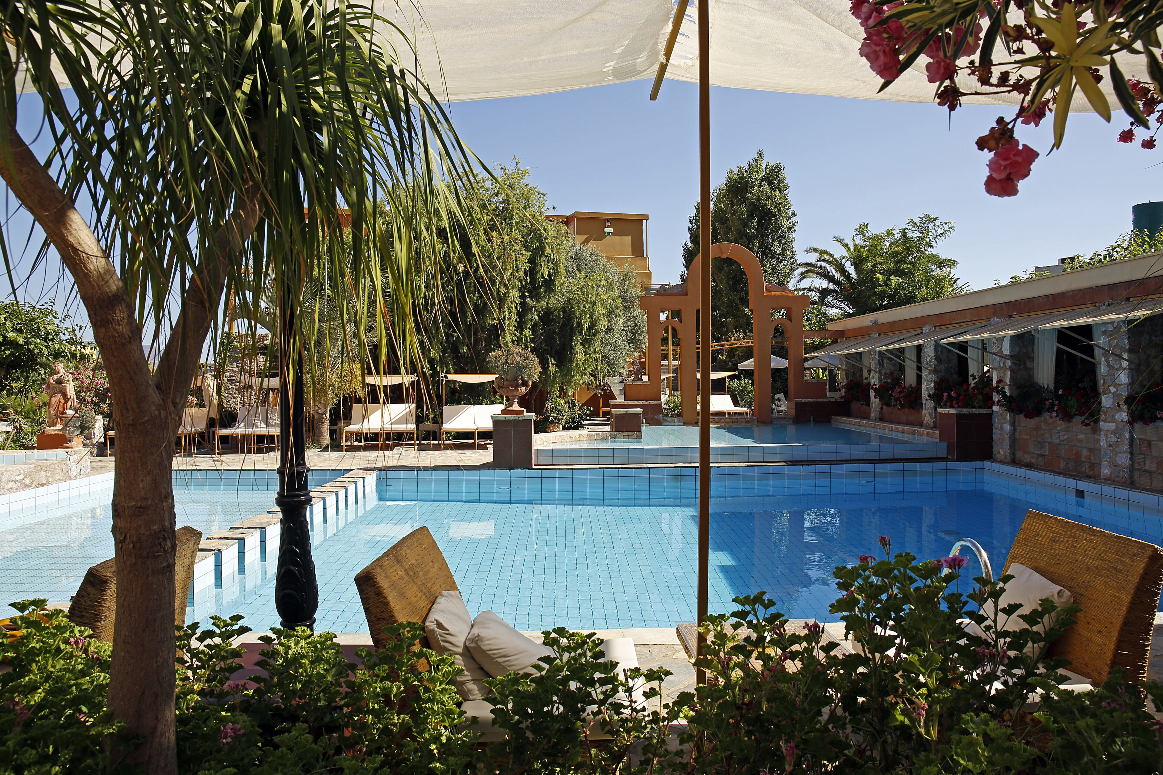 2 outdoor pools, open 10:30 AM to 6:30 PM, pool umbrellas, pool loungers