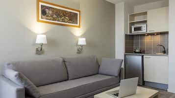 Apartamento, 1 quarto (4 people) | Escrivaninha, quartos à prova de som, Wi-Fi de cortesia