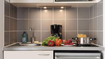 Fridge, microwave, stovetop, cookware/dishes/utensils