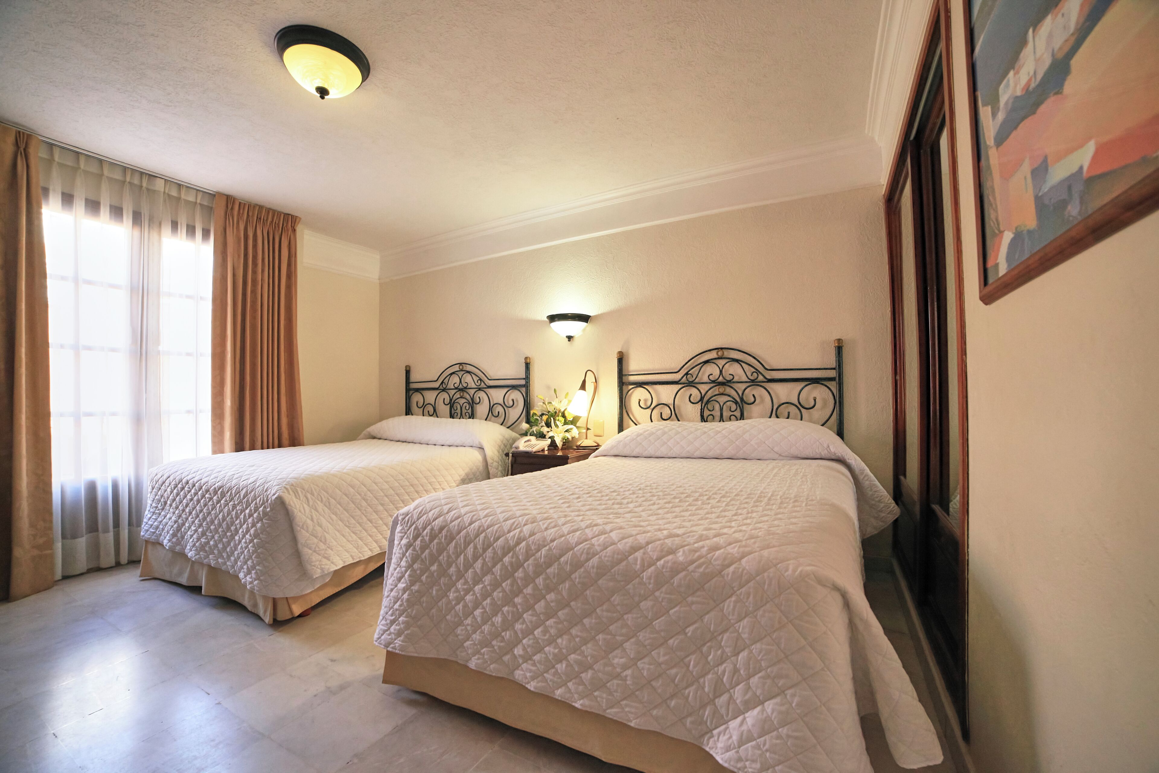 family room | minibar, in-room safe, desk, iron/ironing board