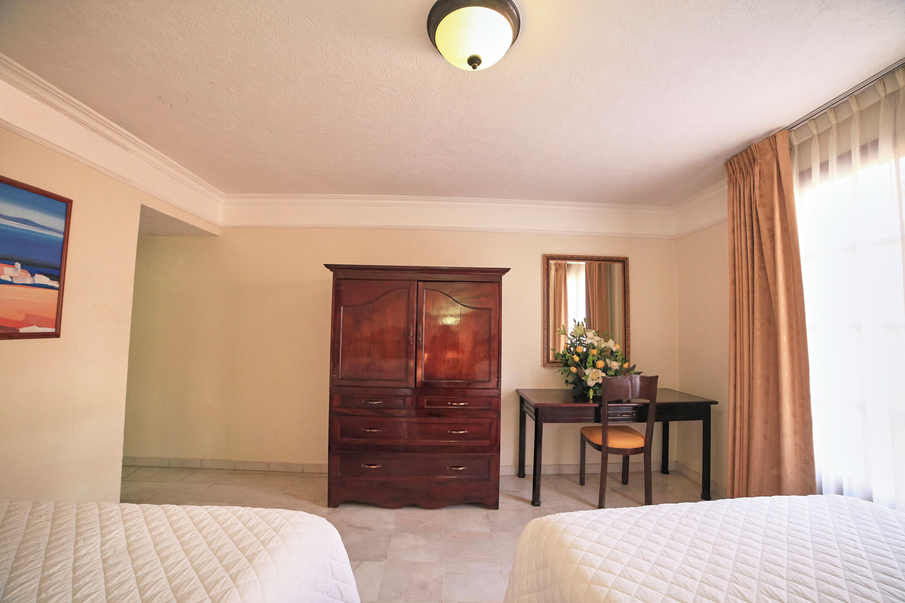 family room | minibar, in-room safe, desk, iron/ironing board