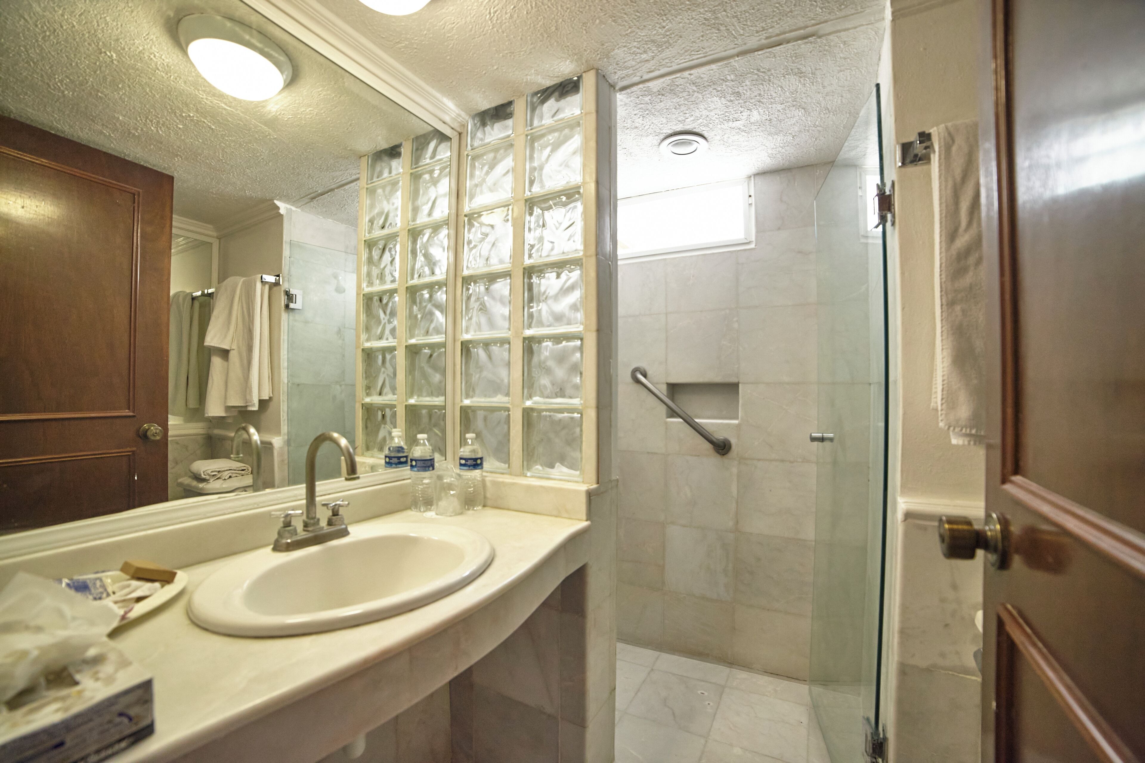 family room | bathroom | shower, free toiletries, hair dryer, towels