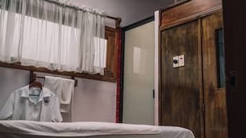 Enjoy a peaceful retreat with a skylight above the bed and a convenient wardrobe with mirror.