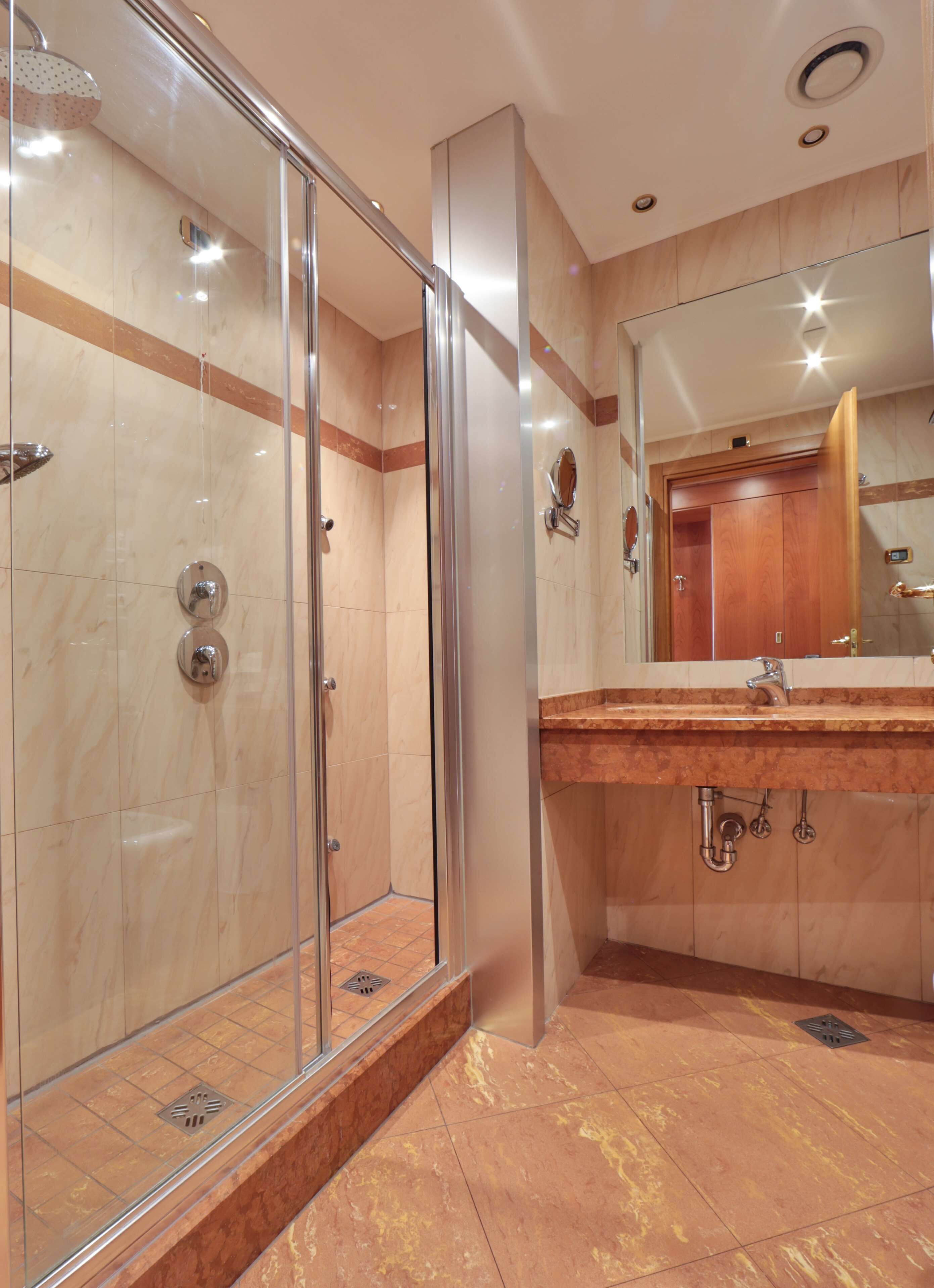 shower, rainfall showerhead, hair dryer, towels