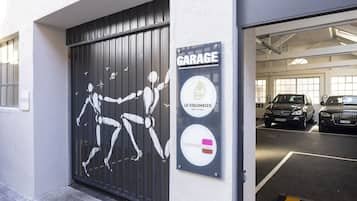 LE COLOMBIER HOTEL COLMAR offers secure parking with designated spaces.