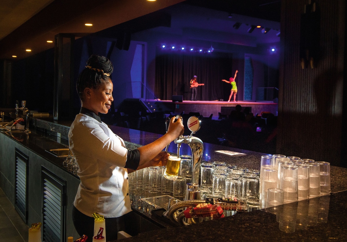 Enjoy live performances and refreshing drinks at our lively bar.