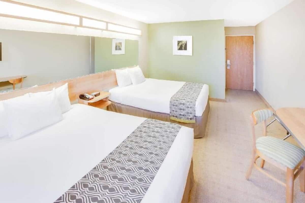 Premium bedding, pillowtop beds, desk, blackout drapes