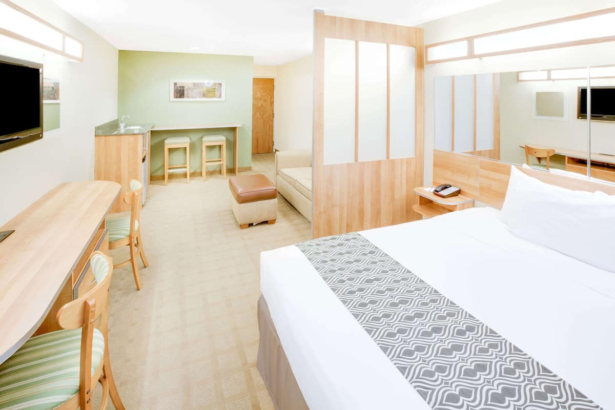 premium bedding, pillow-top beds, desk, blackout curtains