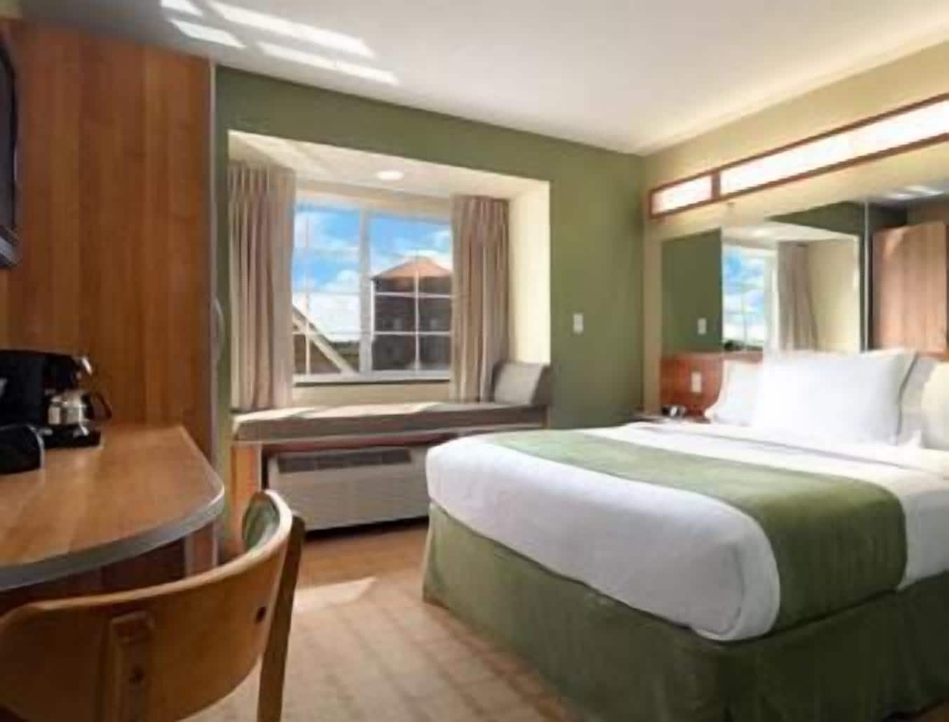 premium bedding, pillow-top beds, desk, blackout curtains