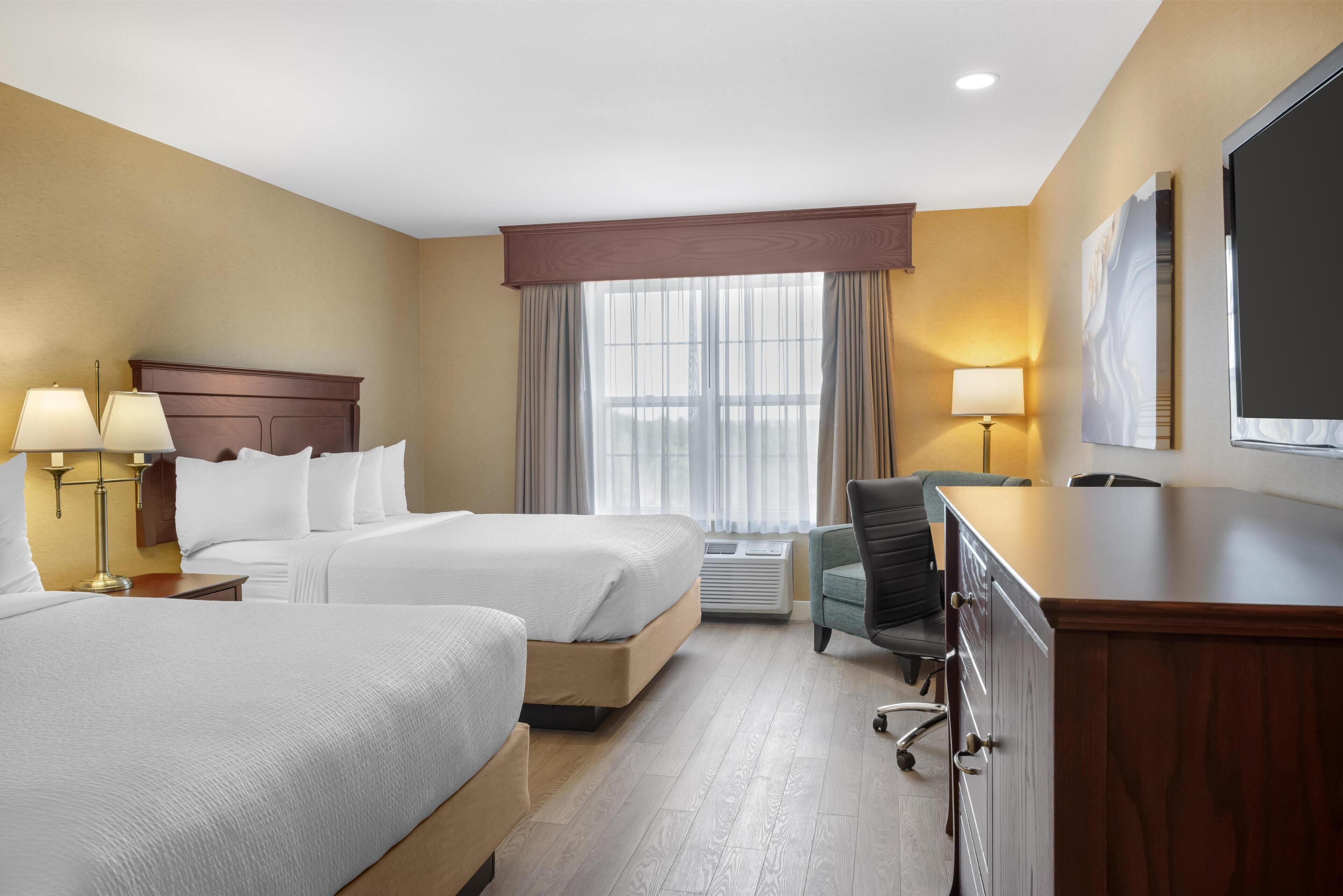 Suite, 2 Queen Beds, Non Smoking, Refrigerator & Microwave (Larger Room)