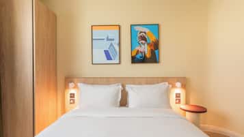 Premium bedding, memory-foam beds, minibar, in-room safe