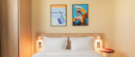 Standaard kamer | Luxe beddengoed, bedden met traagschuimmatrassen, een minibar