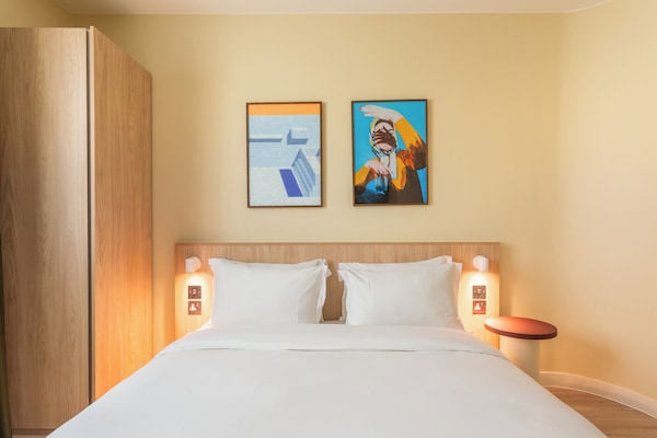 Premium bedding, memory foam beds, minibar, in-room safe