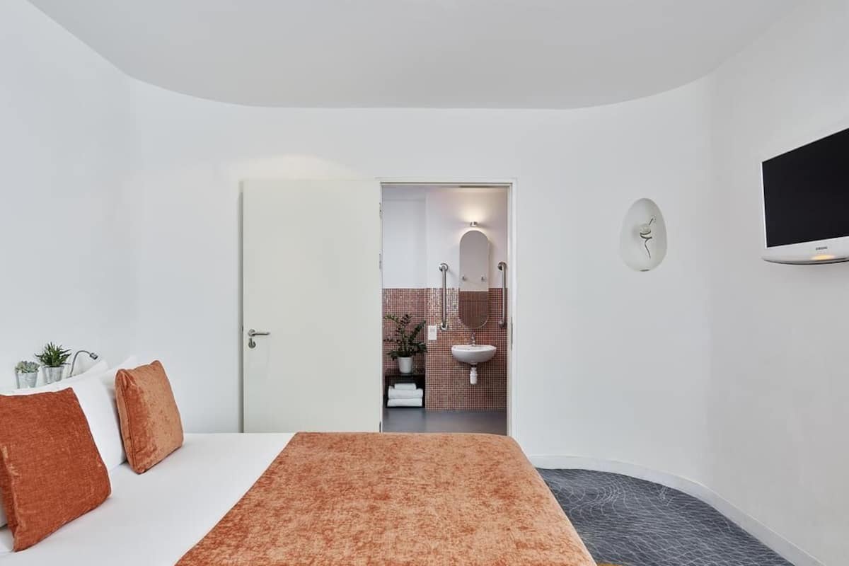 Premium bedding, memory foam beds, minibar, in-room safe