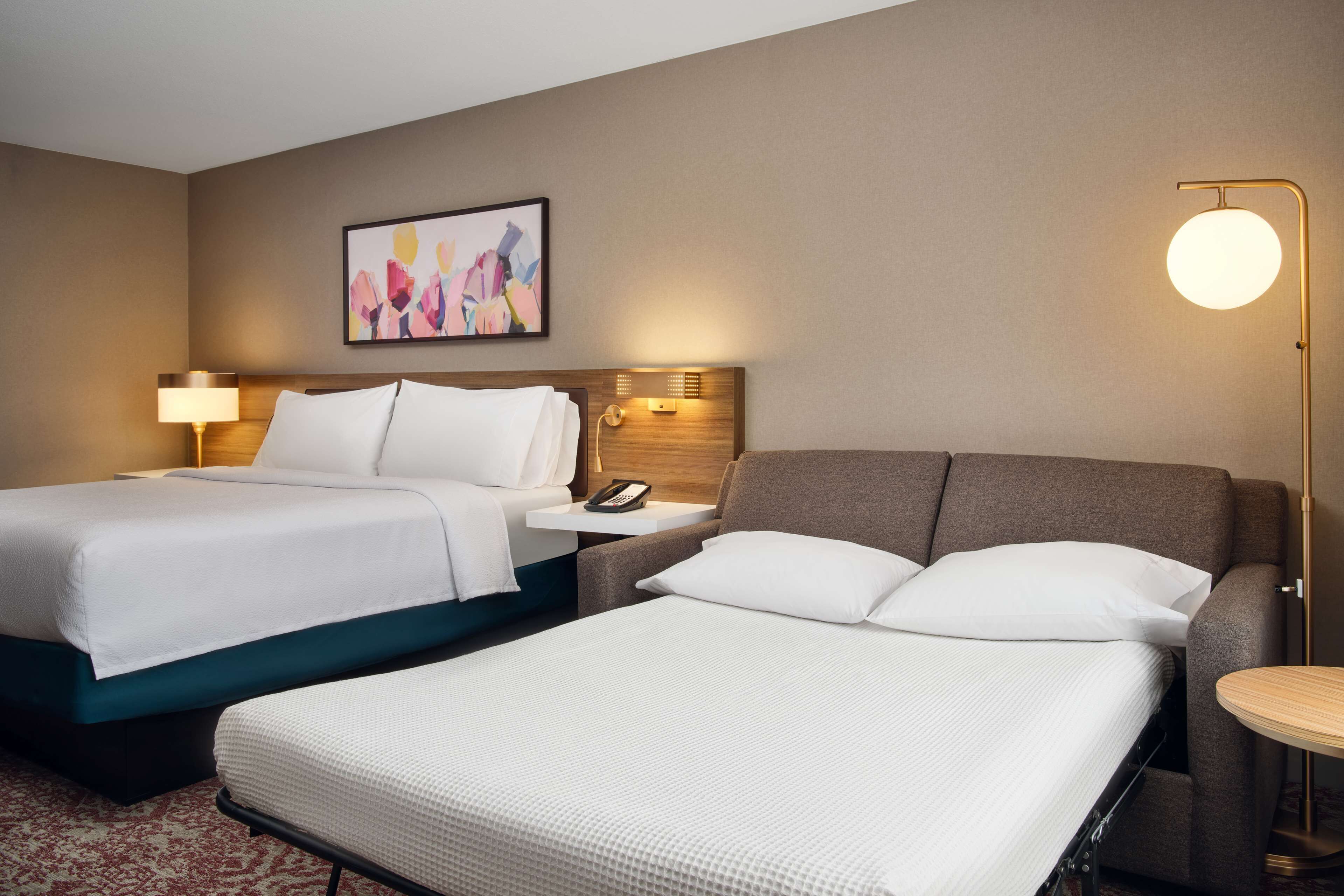 room, 1 king bed with sofa bed | living area | 42-inch lcd tv with cable channels, tv