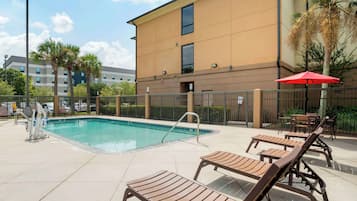 Outdoor pool, open 7:00 AM to 10:00 PM, pool umbrellas, sun loungers