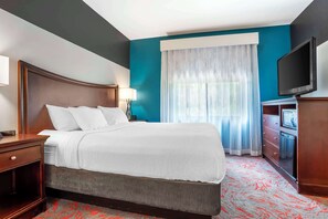 Desk, laptop workspace, blackout drapes, iron/ironing board